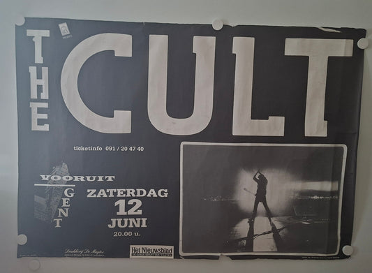 Poster for 'The Cult' concert featuring a silhouette of a person on stage.