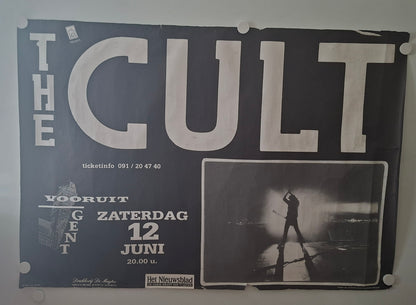 Poster for 'The Cult' concert featuring a silhouette of a person on stage.